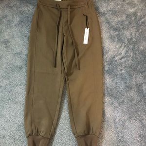 Mid rise jogger. Dressy not work out joggers:)